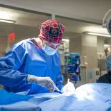 Intern performing surgery