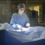 Medical staff performing surgery