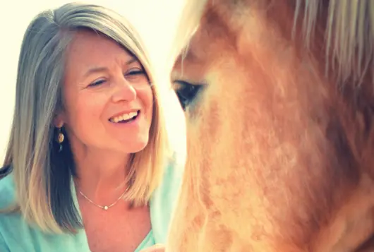 Katherine with her brown horse Sven