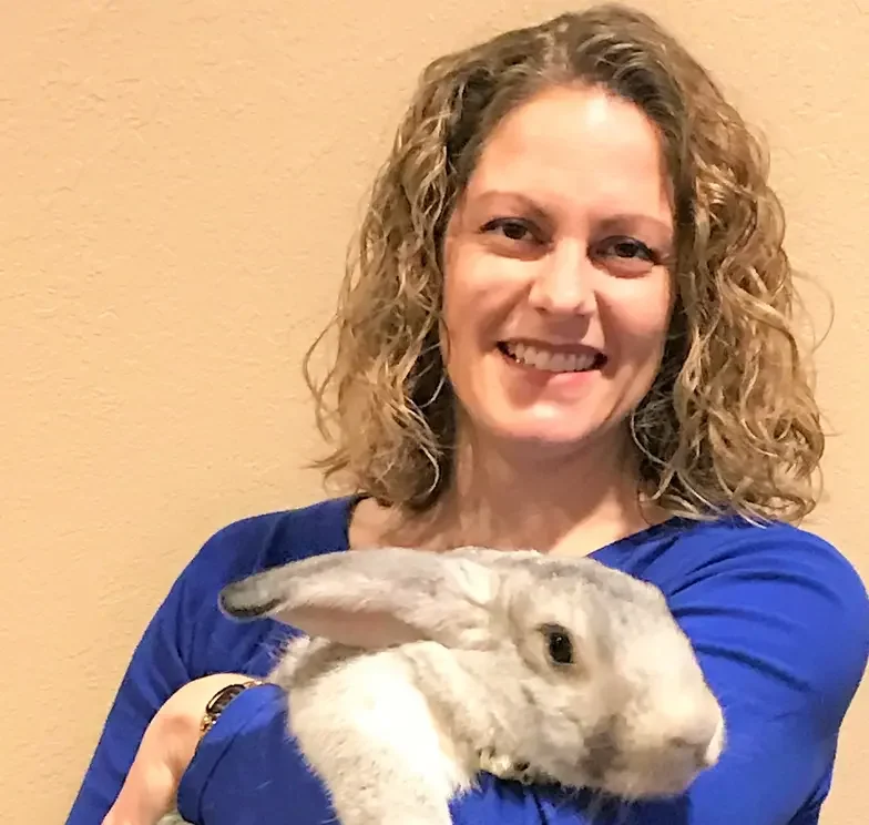 elise holds a large rabbit