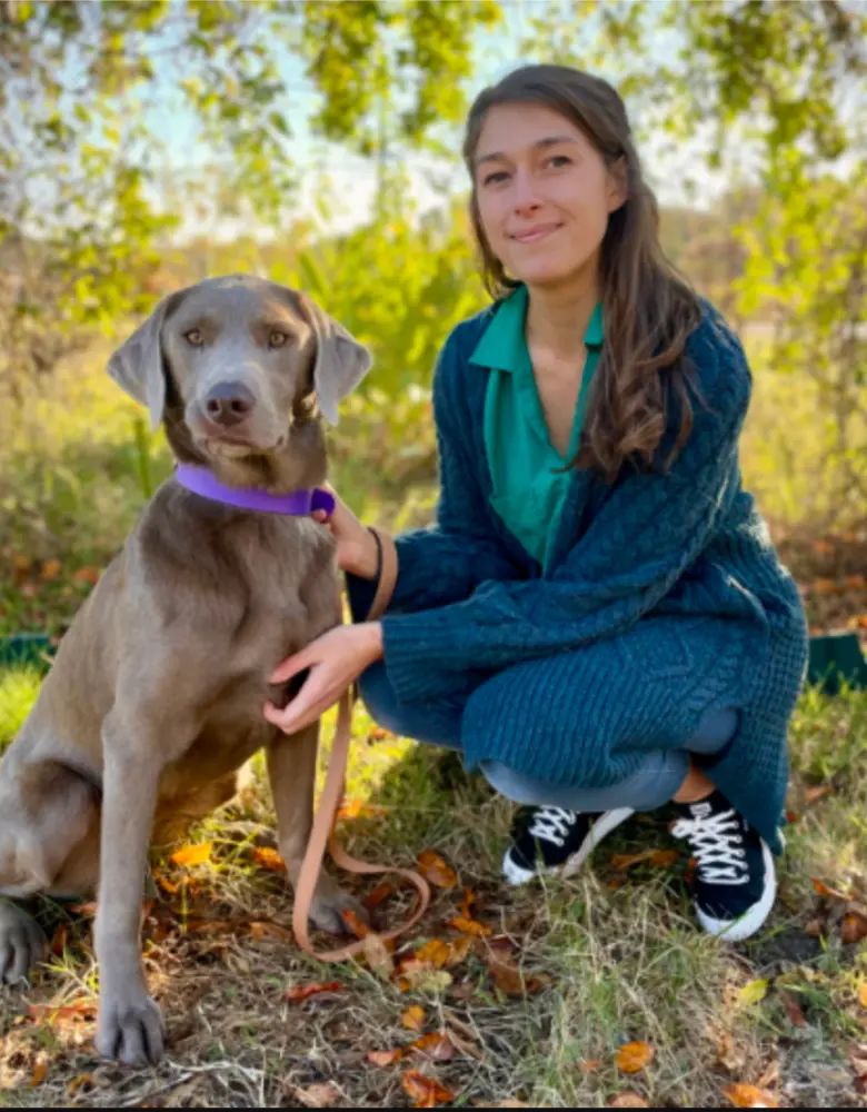 Photo of Meredith Bleuer with brown dog