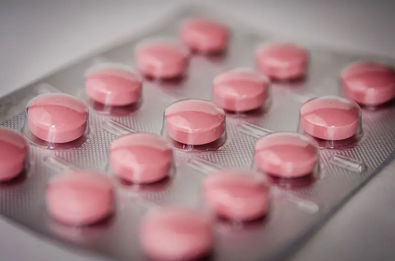 blister pack of several pink pills